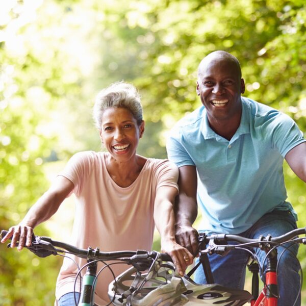Happy couple riding bikes